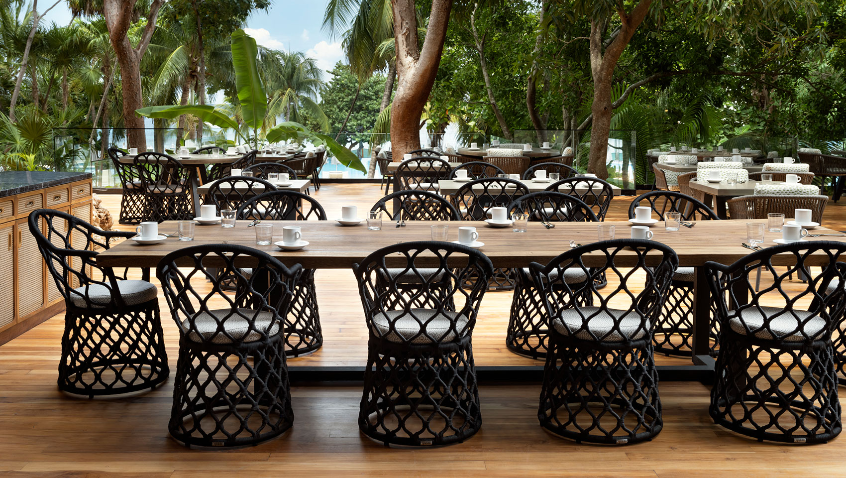 Image of Alera Bar with backlit geometric shelving