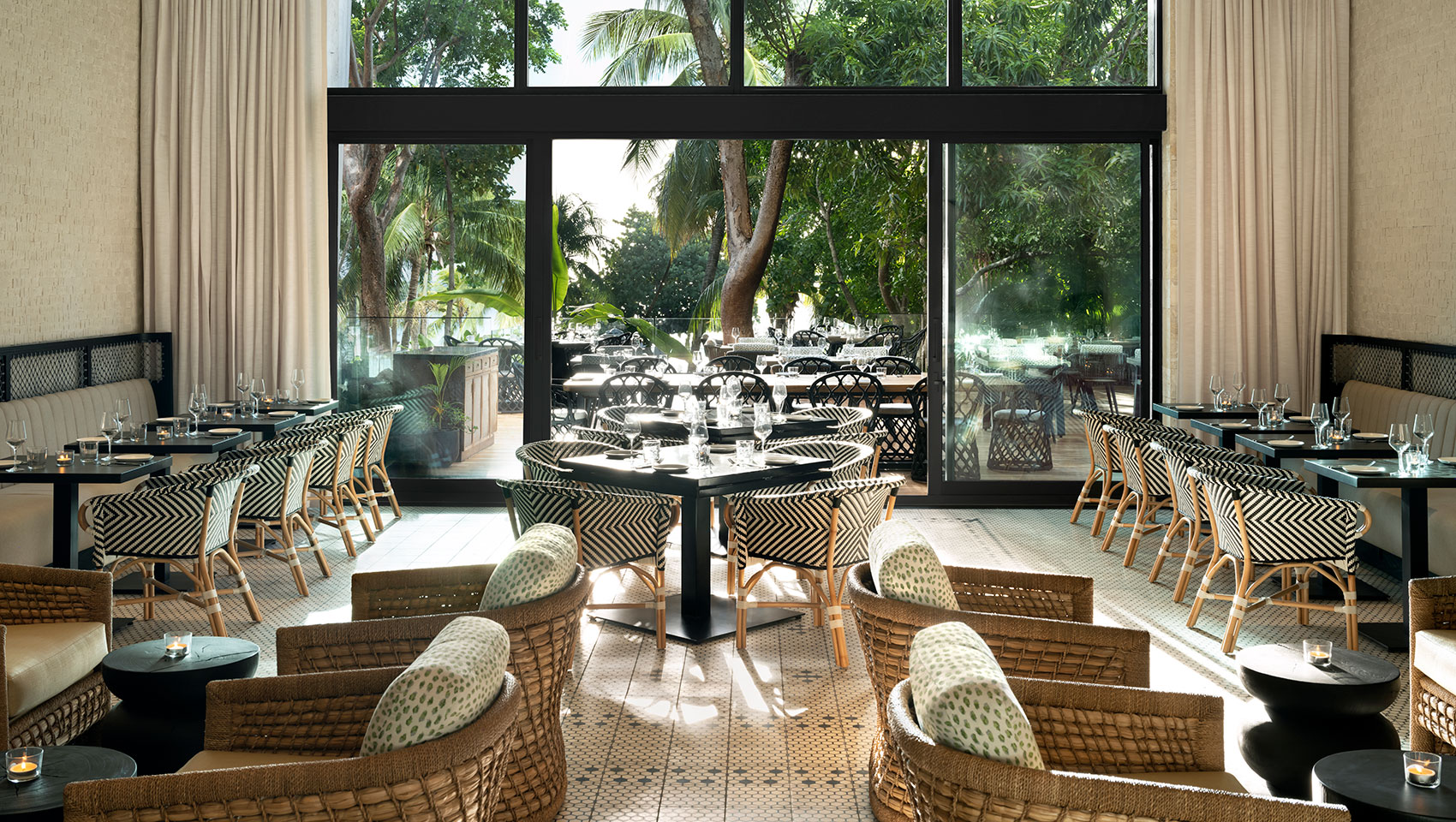 Indoor dining room with large window overlook patio