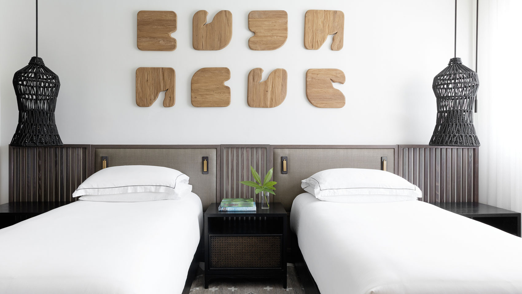 two beds in room in Beachfront Penthouse at Kimpton Grand Roatan Resort