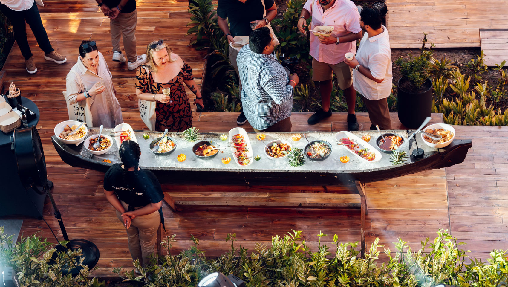 Guests at Grand Roatan Food & Wine Festival looking at food