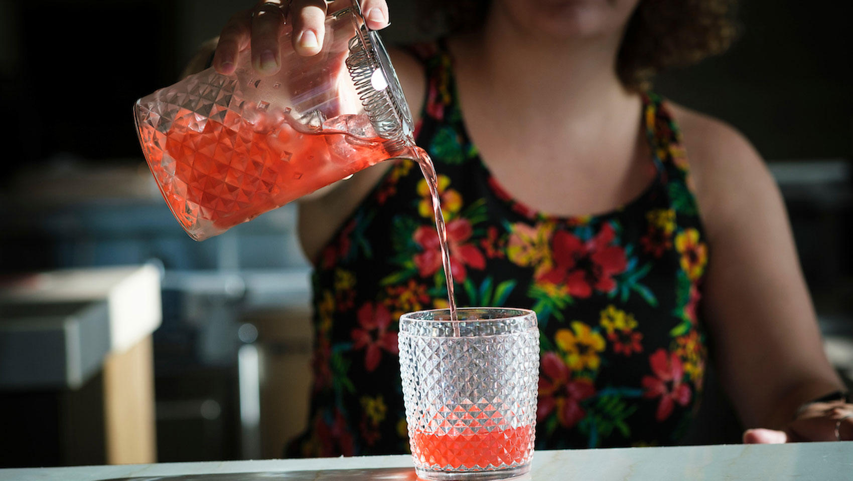 a drink being poured at Vos bar