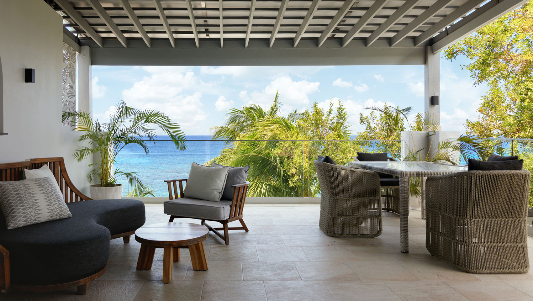 Balcony in One Bedroom Premium Villa Suite Beachfront at Kimpton Grand Roatan Resort