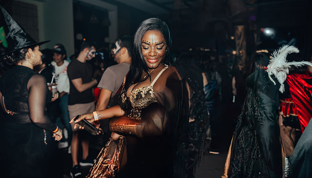 Woman enjoying a Halloween party dressed in Costume