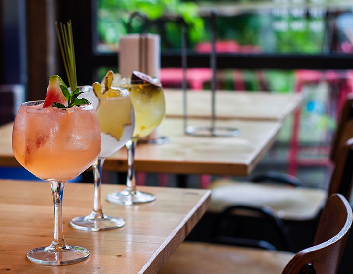 three cocktails on table