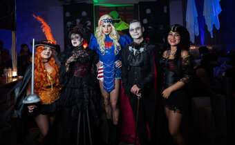 Guests in costume at Grand Roatan Halloween Party