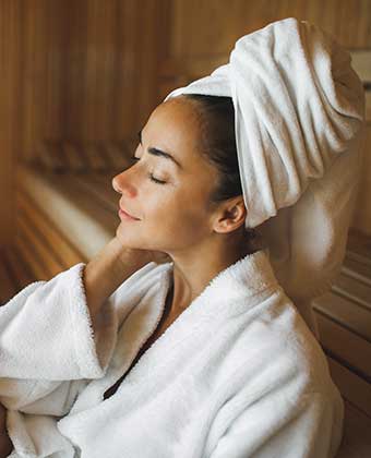 Woman in spa robe