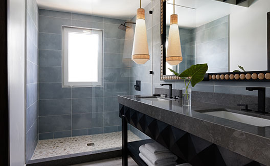 Two Bedroom Beachfront Penthouse view of shower and sink